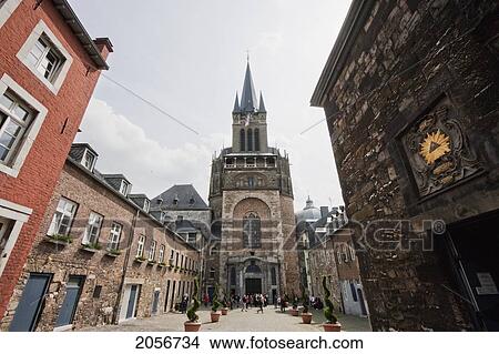 Picture - View Across The Domhof Courtyard To The Carolingian Westwork (Pink Stone), Baroque Porch (Bottom) And 19Th-Century Tower (Top) Of Aachen Cathedral, Aachen, Germany. Fotosearch