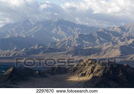 View across the Indus Valley from the Shanti (Peace) Stupa. Leh was the capital of the Himalayan kingdom of Ladakh, now the Leh District in the state of Jammu and Kashmir, India. Leh is at an altitude of 3, 500 meters (11, 483 ft). View Large Photo Image Stock Image - View across the Indus Valley from the Shanti (Peace) Stupa. Leh was the capital of the Himalayan kingdom of Ladakh, now the Leh District in the state of Jammu and Kashmir, India. Leh is at an altitude of 3, 500 meters (11, 483 ft).. Fotosearch