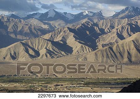 View across the Indus Valley from the Shanti (Peace) Stupa. Leh was the capital of the Himalayan kingdom of Ladakh, now the Leh District in the state of Jammu and Kashmir, India. Leh is at an altitude of 3, 500 meters (11, 483 ft). View Large Photo Image Stock Image - View across the Indus Valley from the Shanti (Peace) Stupa. Leh was the capital of the Himalayan kingdom of Ladakh, now the Leh District in the state of Jammu and Kashmir, India. Leh is at an altitude of 3, 500 meters (11, 483 ft).. Fotosearch