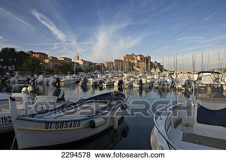 Stock Photo - View across the marina and citadel to Calvi. The Balagne district. Corsica. France. Fotosearch