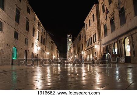 Stock Image - View Along Placa Towards The Pile Gate, Night. Fotosearch
