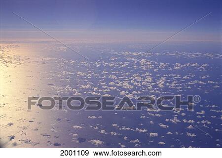 View Clouds Over Ocean, Sunlight Shine And Reflections View Large Photo Image Stock Photo - View Clouds Over Ocean, Sunlight Shine And Reflections. Fotosearch