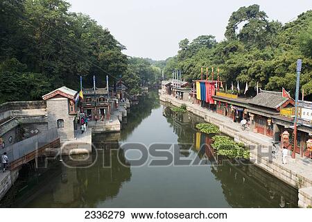 Stock Photo - View Down The River And Buildings Along The Shoreline; Beijing, China. Fotosearch