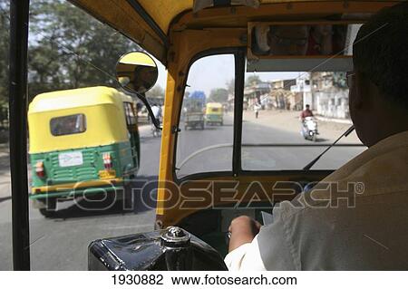 Stock Image - View from auto-rickshaw in Ahmedabad City, Gujurat State, India., Ahmedabad City, Gujurat State, India.. Fotosearch