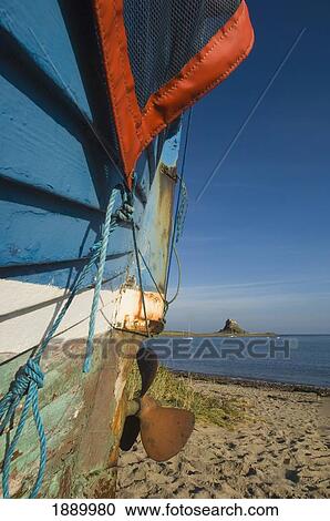 View From Beach, Beside A Boat, Of Lindisfarne Castle. View Large Photo Image Stock Image - View From Beach, Beside A Boat, Of Lindisfarne Castle.. Fotosearch