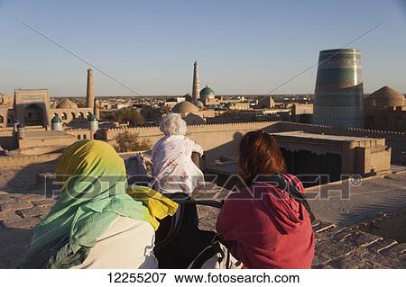 Stock Photo - View from city walls at sunset, Ichan Kala Old City, Kizilkum desert; Khiva, Khwarezm region, Uzbekistan. Fotosearch