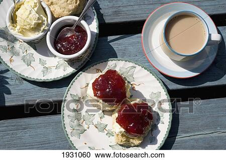 Stock Image - View From Directly Above, Cream Tea And Scones At Downhouse Farm, Eype, West Dorset; Eype, West Dorset. Fotosearch