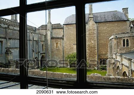 Stock Image - View From Inside The Room Of Lacock Abbey, Lacock, Wiltshire, Uk. Fotosearch