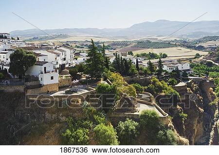 View From Puente Nuevo Bridge Across El Tajo Gorge Above River Guadalevin; Ronda, Spain View Large Photo Image Stock Photograph - View From Puente Nuevo Bridge Across El Tajo Gorge Above River Guadalevin; Ronda, Spain. Fotosearch