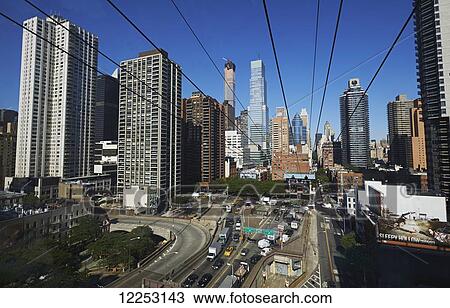 View from Roosevelt Island tram looking back towards Manhattan; New York City, New York, United States of America View Large Photo Image Stock Image - View from Roosevelt Island tram looking back towards Manhattan; New York City, New York, United States of America. Fotosearch