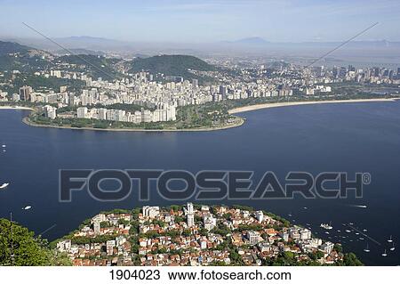Stock Image - View From Sugar Loaf Mountain Of Urca, Flamengo And Botafogo Across Bay, Rio De Janeiro, Brazil. Fotosearch