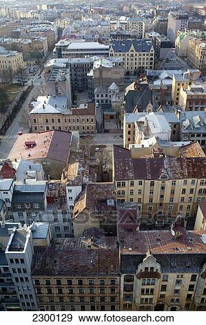 Stock Photo - View from the 26th floor of the Reval Hotel Skyline Bar, at sunset, Riga, Latvia.. Fotosearch