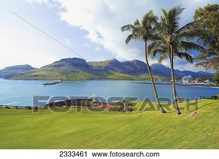 Stock Image - View from the Kauai Lagoon Golf Club towards the Nawiliwili Harbor; Kauai, Hawaii, United States of America. Fotosearch