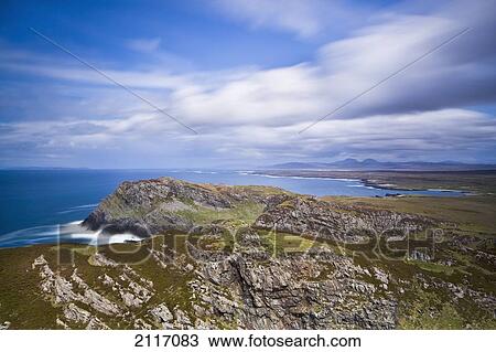 Stock Image - View From The Sanaigmore Cliffs On Islay Towards The Paps Of Juray And Colonsay; Isle Of Islay Southern Hebrides Scotland. Fotosearch