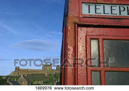 Stock Photo - View From Traditional Telephone Booth Of Bamburgh Castle.. Fotosearch