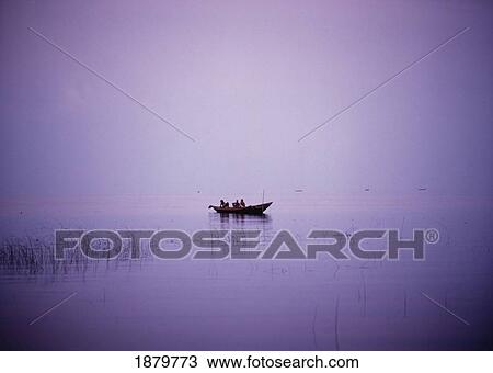 View Of A Boat In A Placid Lake. View Large Photo Image Stock Image - View Of A Boat In A Placid Lake.. Fotosearch