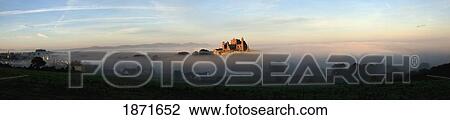 View Of A City Through The Fog; Tipperary, Ireland View Large Photo Image Stock Image - View Of A City Through The Fog; Tipperary, Ireland. Fotosearch