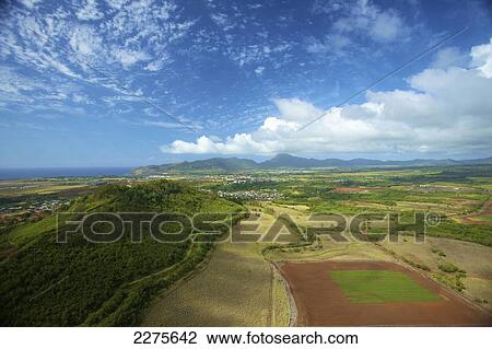View of an urban area and landscape on an hawaiian island; Na Pali coast of Kauai, Hawaii, United States of America View Large Photo Image Stock Image - View of an urban area and landscape on an hawaiian island; Na Pali coast of Kauai, Hawaii, United States of America. Fotosearch