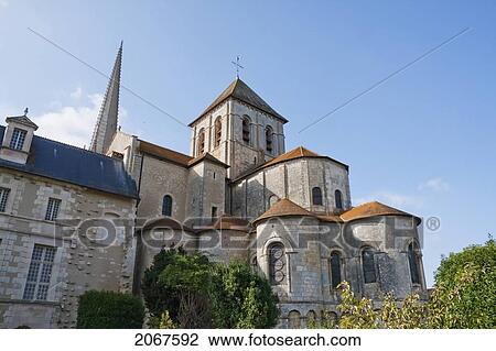 Stock Image - View Of Apse, Radiating Chapels And Crossing Tower Of The Abbey Church Of Saint-Savin Sur Gartempe From The Southeast, Saint-Savin Sur Gartempe, Vienne, France. Fotosearch