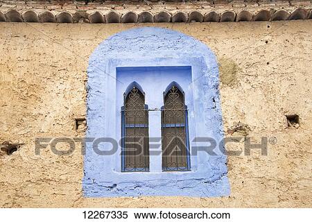 View of blue painted window set in rustic wall; Chefchaouen, Morocco View Large Photo Image Stock Photography - View of blue painted window set in rustic wall; Chefchaouen, Morocco. Fotosearch