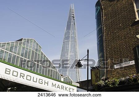 Stock Photograph - View of Borough Market and the Shard from Park Street; London, England. Fotosearch