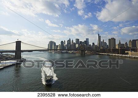 View of Brooklyn Bridge Park, Brooklyn Bridge, and Manhattan from Manhattan Bridge; New York City, New York, United States of America View Large Photo Image Stock Photo - View of Brooklyn Bridge Park, Brooklyn Bridge, and Manhattan from Manhattan Bridge; New York City, New York, United States of America. Fotosearch