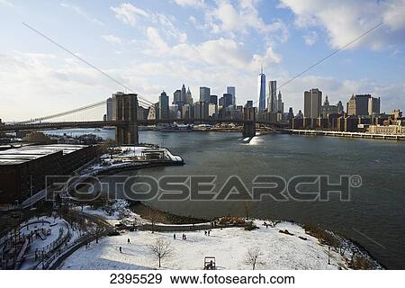 View of Brooklyn Bridge Park, Brooklyn Bridge, and Manhattan from Manhattan Bridge; New York City, New York, United States of America View Large Photo Image Stock Photo - View of Brooklyn Bridge Park, Brooklyn Bridge, and Manhattan from Manhattan Bridge; New York City, New York, United States of America. Fotosearch