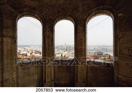 View Of Budapest, As Seen Through The Arches Of The Halaszbastya Or Fisherman's Bastion, Budapest, Hungary View Large Photo Image Stock Image - View Of Budapest, As Seen Through The Arches Of The Halaszbastya Or Fisherman's Bastion, Budapest, Hungary. Fotosearch