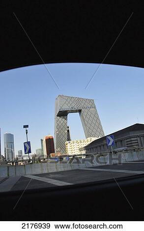 View Of Buildings In An Urban Area From Under A Covered Parking Area; Beijing China View Large Photo Image Stock Photo - View Of Buildings In An Urban Area From Under A Covered Parking Area; Beijing China. Fotosearch