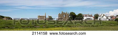 View Of Buildings On Lindisfarne; Holy Island Northumberland England View Large Photo Image Stock Photo - View Of Buildings On Lindisfarne; Holy Island Northumberland England. Fotosearch