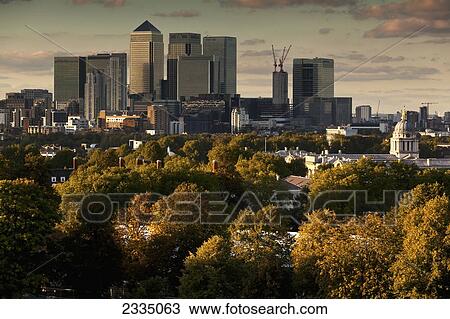 Stock Image - View Of Canary Wharf From Greenwich Park In Autumn; London, England, Uk. Fotosearch
