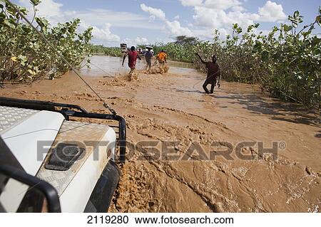 View of car crossing river; Kenya View Large Photo Image Stock Image - View of car crossing river; Kenya. Fotosearch