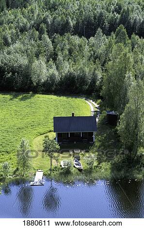 View Of Cottage Beside Forest And Lake, Aerial View View Large Photo Image Stock Image - View Of Cottage Beside Forest And Lake, Aerial View. Fotosearch