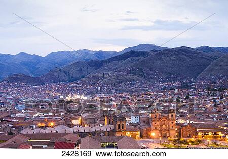 Stock Photo - View of Cusco at dusk; Cusco, Peru. Fotosearch