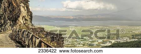 View Of Dali And Lake Er Hu (Erhai Hu) From Cangshan Mountain; Dali, Yunnan Province, China View Large Photo Image Stock Image - View Of Dali And Lake Er Hu (Erhai Hu) From Cangshan Mountain; Dali, Yunnan Province, China. Fotosearch