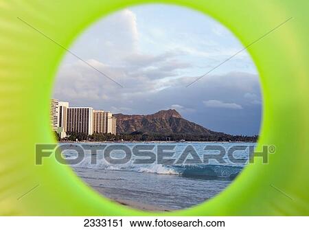 View of Diamond Head seen through a green inflatable tube; Waikiki, Oahu, Hawaii, United States of America View Large Photo Image Stock Image - View of Diamond Head seen through a green inflatable tube; Waikiki, Oahu, Hawaii, United States of America. Fotosearch