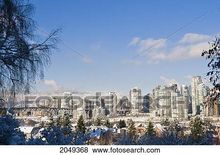 Stock Photo - View Of Downtown In Winter Showing Granville Bridge, Vancouver, British Columbia. Fotosearch