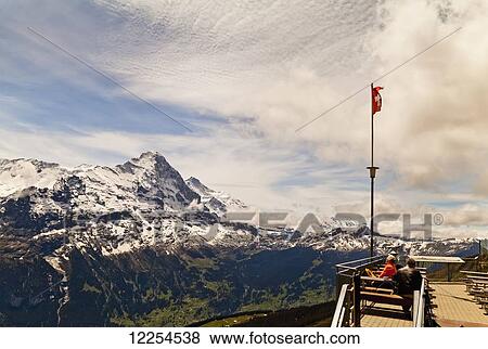 View of Eiger and Jungfrau from First; Grindelwald, Bernese Oberland, Switzerland View Large Photo Image Stock Photo - View of Eiger and Jungfrau from First; Grindelwald, Bernese Oberland, Switzerland. Fotosearch