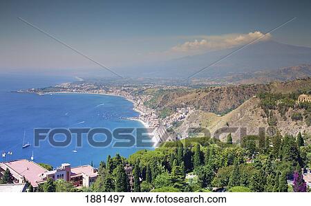 View Of Giardini Naxos And Mount Etna; Taormina, Sicily, Italy View Large Photo Image Stock Photo - View Of Giardini Naxos And Mount Etna; Taormina, Sicily, Italy. Fotosearch