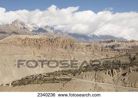 Stock Photograph - View Of High Desert Landscape; Tangbe, Upper Mustang Valley, Nepal. Fotosearch