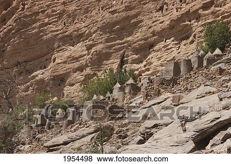 View of Irelli Village, set in the Bandiagara Escarpment, Irelli, Mopti, Mali View Large Photo Image Stock Photo - View of Irelli Village, set in the Bandiagara Escarpment, Irelli, Mopti, Mali. Fotosearch