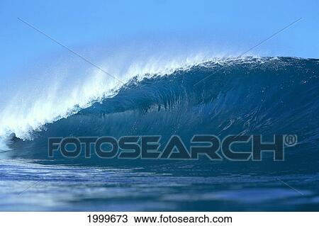 View Of Long, Large, Blue Wave, Curled At One End, Blue Sky In Background C1753 View Large Photo Image Stock Image - View Of Long, Large, Blue Wave, Curled At One End, Blue Sky In Background C1753. Fotosearch