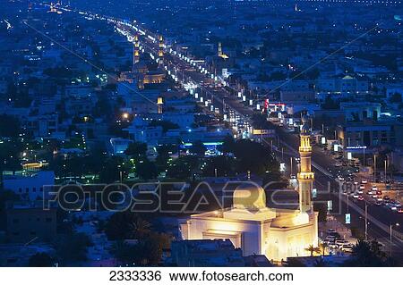 View Of Mosques At Dusk Along The Jumeirah Beach Road; Jumeirah Beach Hotel; Dubai, United Arab Emirates View Large Photo Image Stock Photograph - View Of Mosques At Dusk Along The Jumeirah Beach Road; Jumeirah Beach Hotel; Dubai, United Arab Emirates. Fotosearch