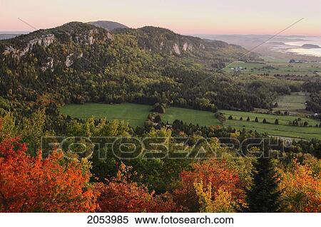 Stock Photography - View Of Mountains And St. Lawrence River At Sunset, Kamouraska Village, Bas-Saint-Laurent Region, Quebec. Fotosearch