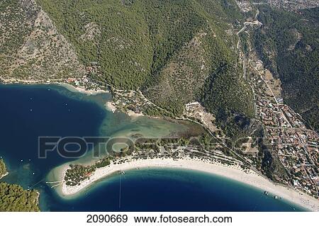 Stock Photo - View Of Oludeniz Which Is Considered A Mecca For Paragliding At Turquoise Coast, Southern Turkey. Fotosearch