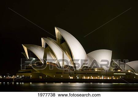Stock Photo - View of Opera House at night; Sydney Harbor. Fotosearch