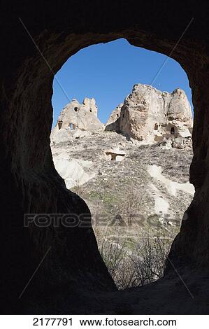 Stock Image - View Of Pancarlik Church And Monastery Through A Keyhole Shaped Hole; Nevsehir Turkey. Fotosearch