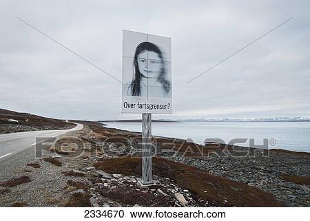 Stock Image - View Of Road Along Coastline; Fjord, Norway. Fotosearch