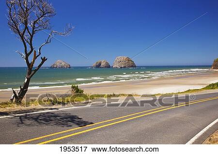 View Of Rock Formations In The Ocean From The Highway Along The Coast; Oceanside Oregon United States Of America View Large Photo Image Stock Photo - View Of Rock Formations In The Ocean From The Highway Along The Coast; Oceanside Oregon United States Of America. Fotosearch