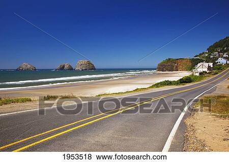 Stock Photo - View Of Rock Formations In The Ocean From The Highway Along The Coast; Oceanside Oregon United States Of America. Fotosearch